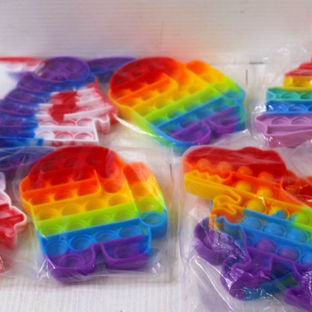 4 Packages of Rainbow Colored Pop-It Fidget Toys